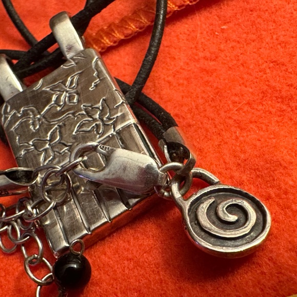 WOW POSHMARK - Authentic Me&Ro Sterling Floral Peace Pendant Leather Cord